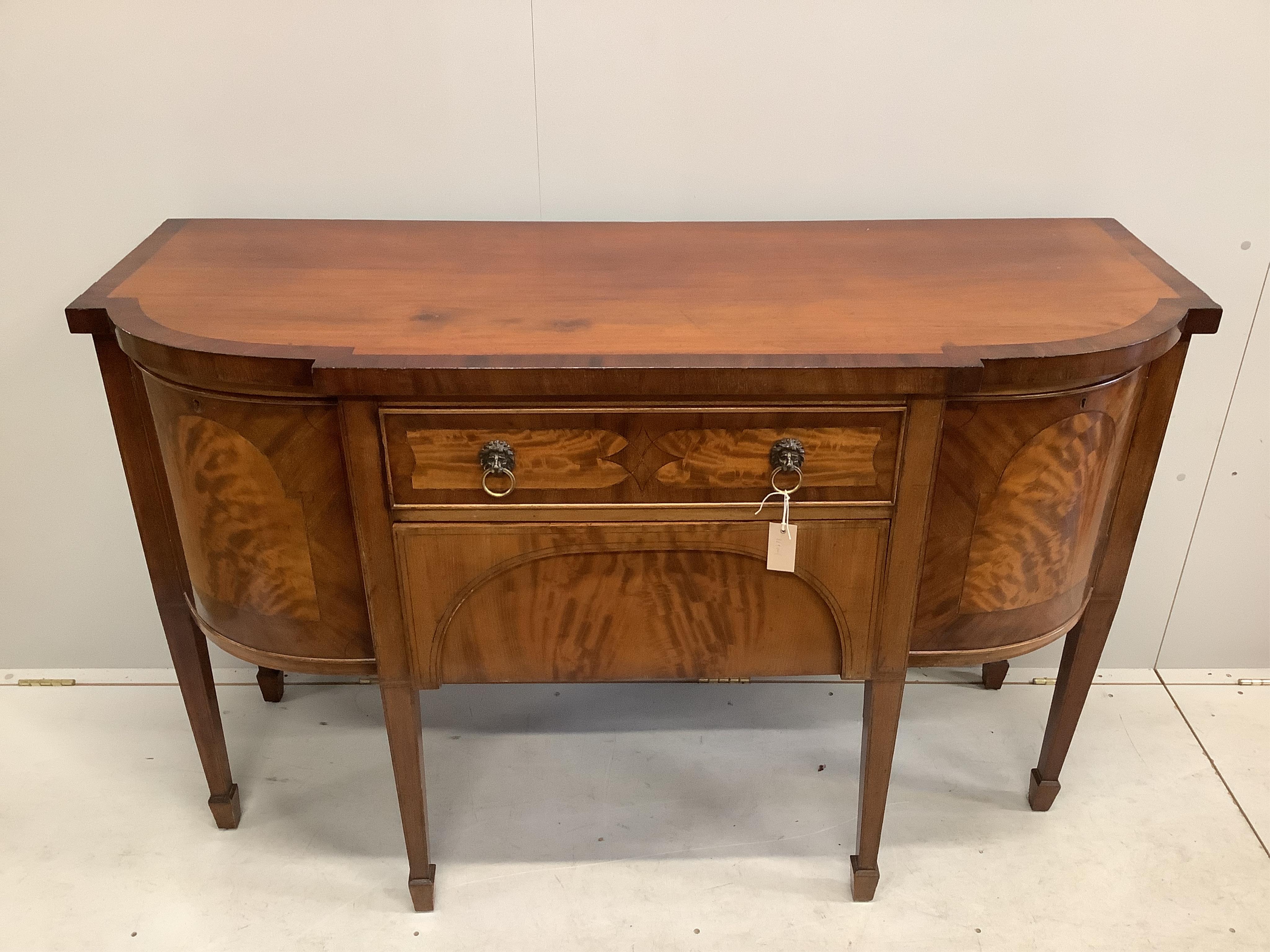 A George IV mahogany bow front sideboard, width 150cm, depth 57cm, height 95cm. Condition - poor to fair